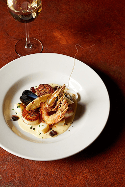 Dessert being served at a dinner party